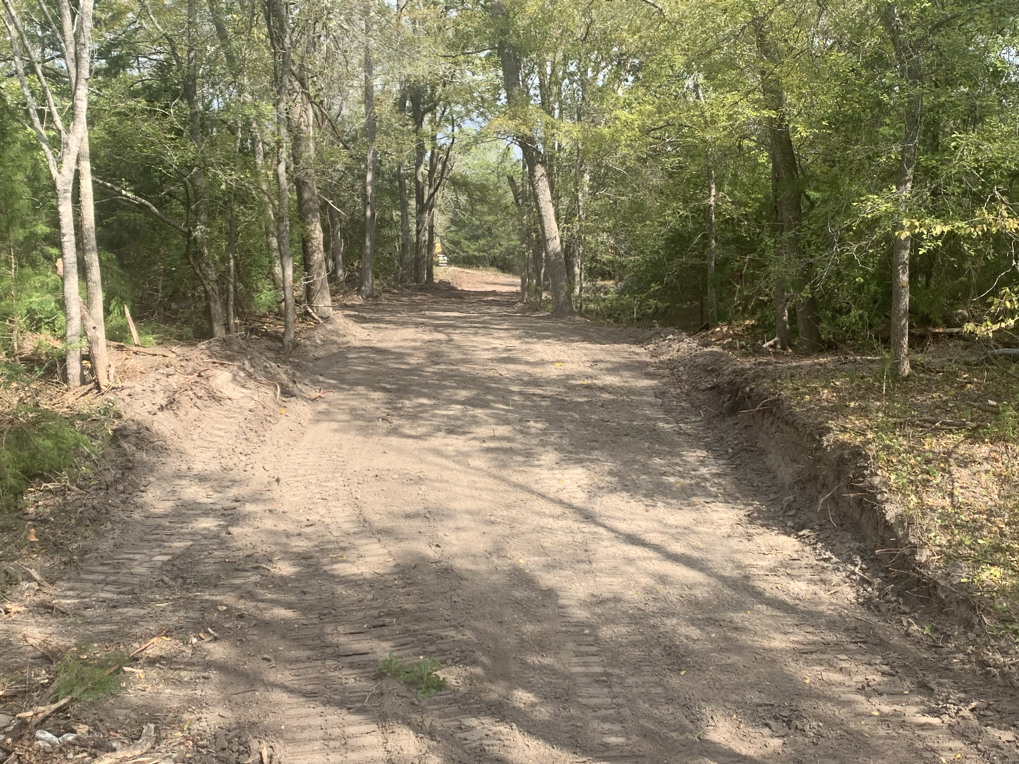 After land clearing: property cleared and ready for development.